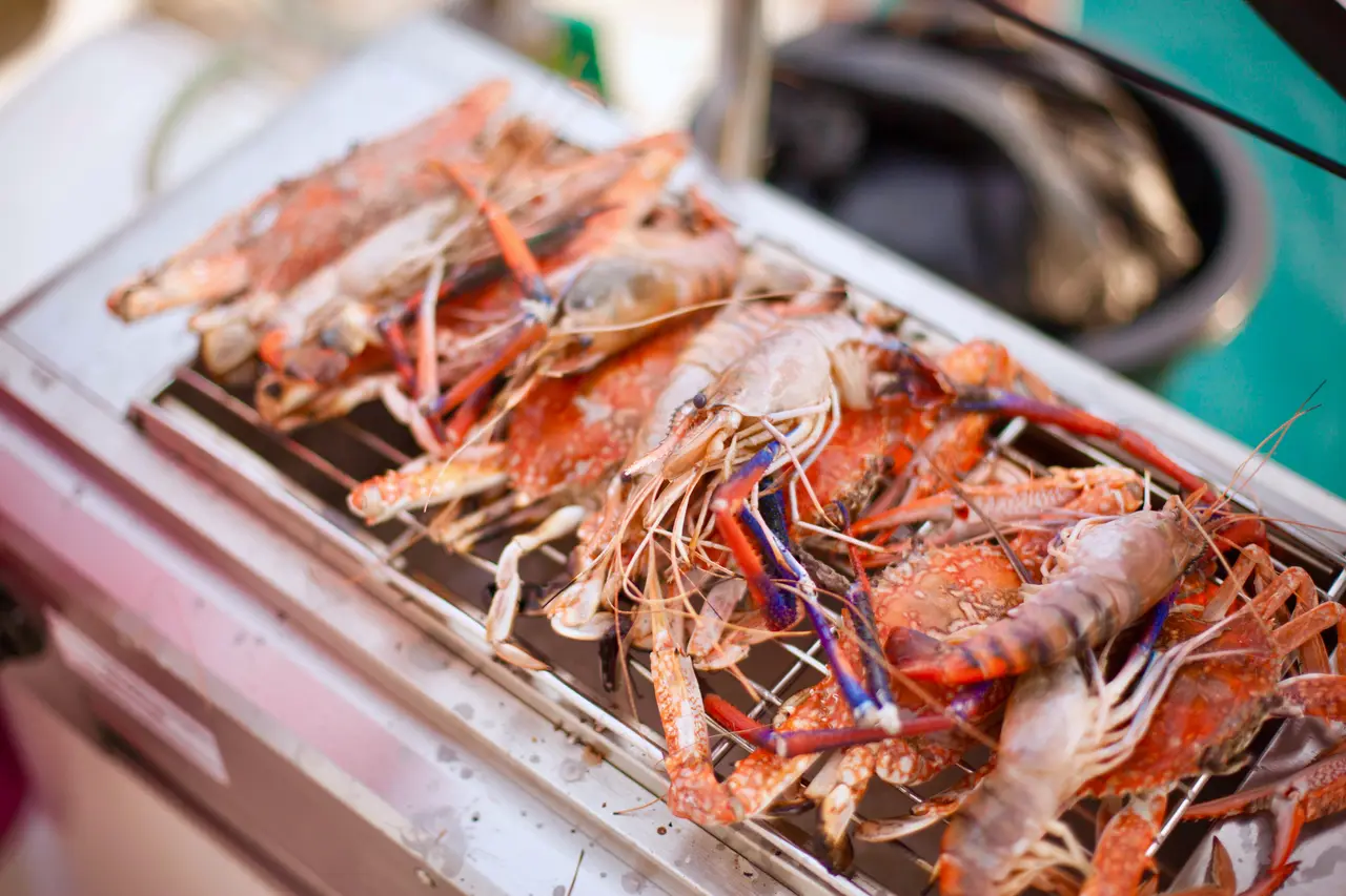 Prawns and seafood on the grill aboard