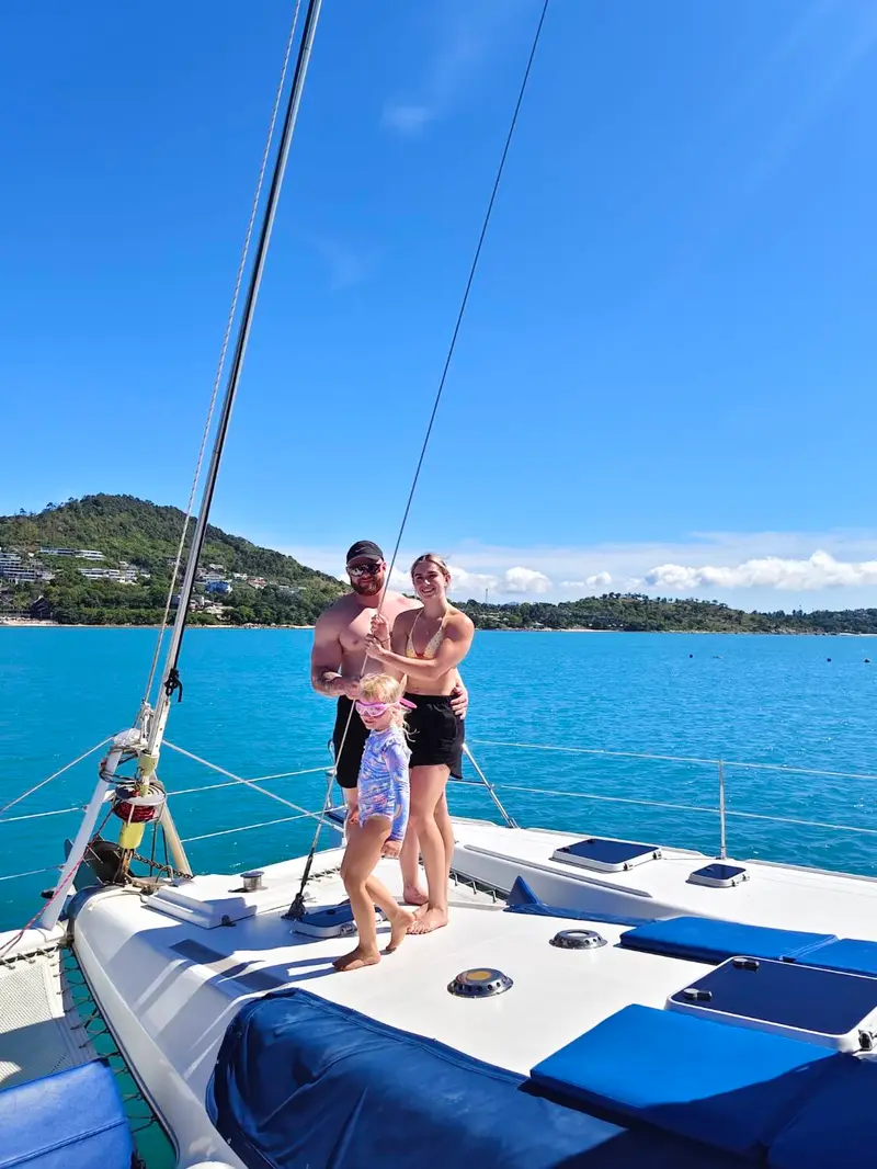 Guests on deck at anchor in the Gulf of Thailand