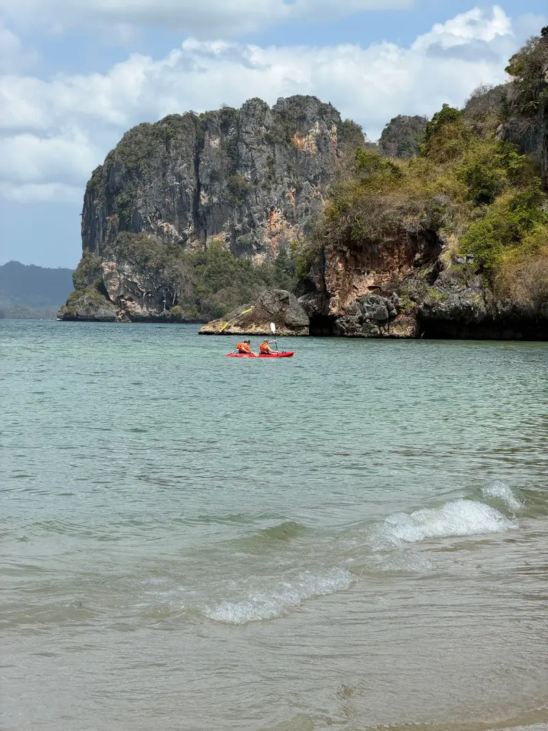 Kayaking beneath limestone cliffs in Thailand