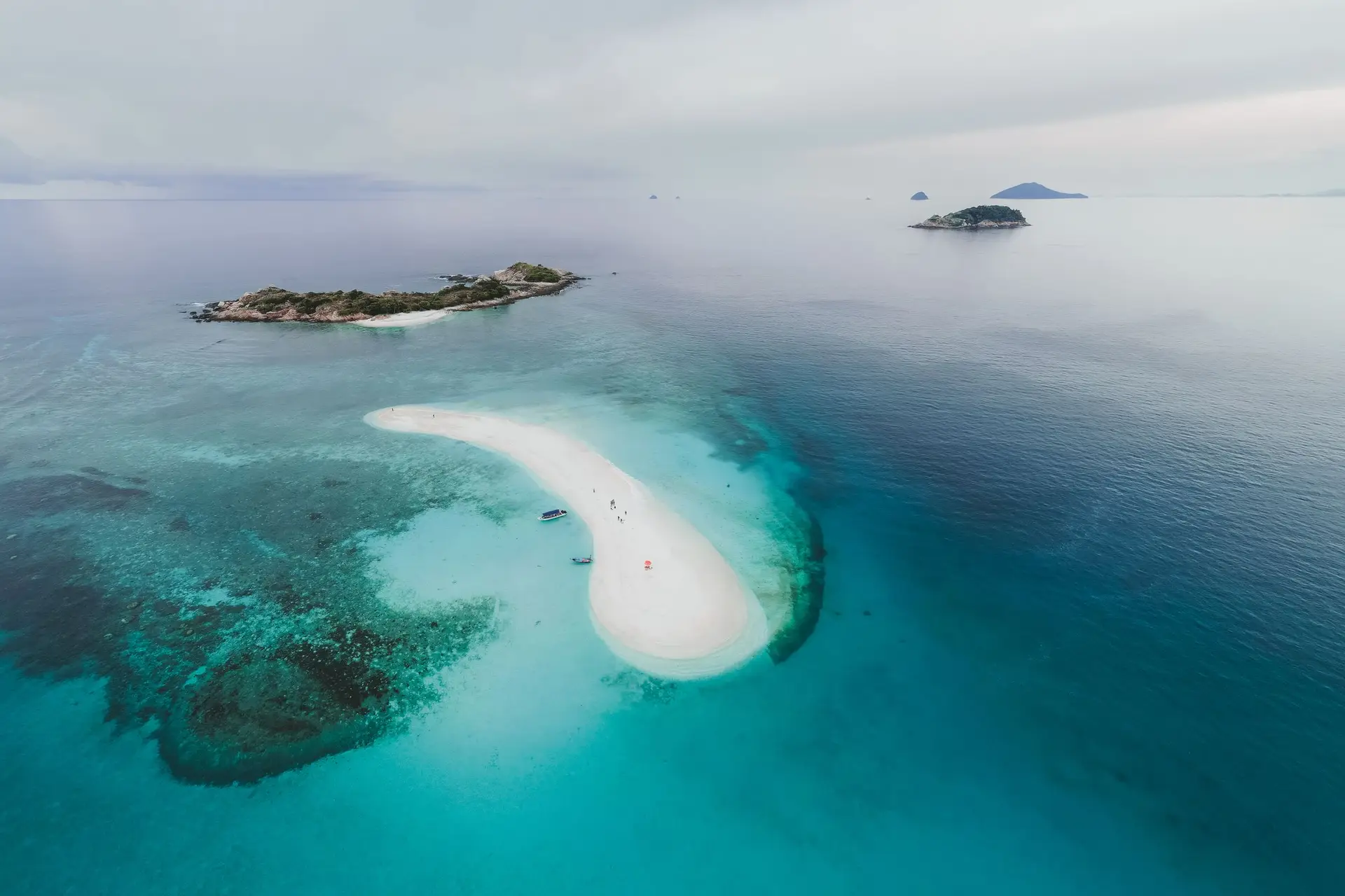 Aerial view of tropical islands in turquoise water in the Gulf of Thailand